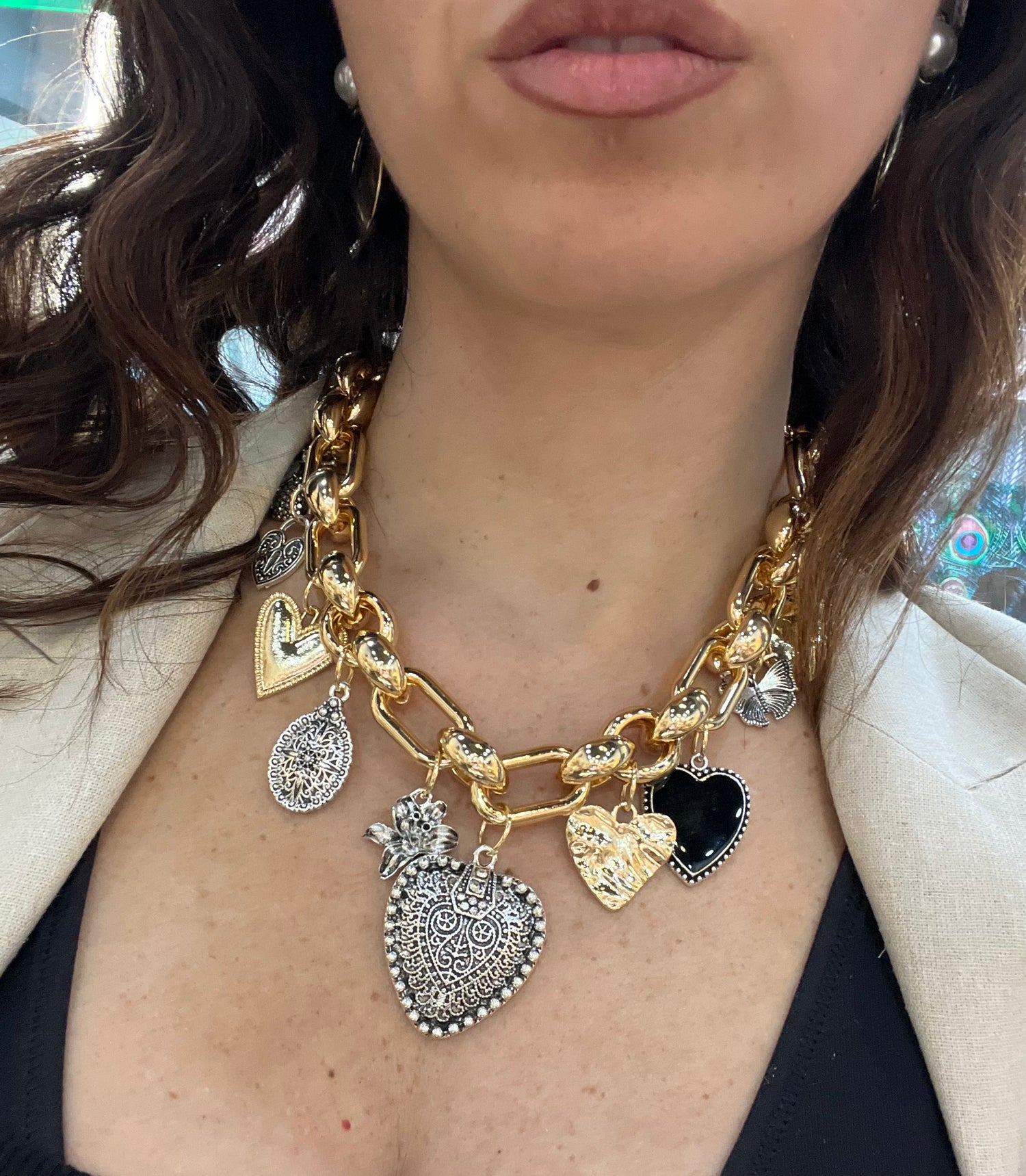 Collana multicharm dorati e argentati